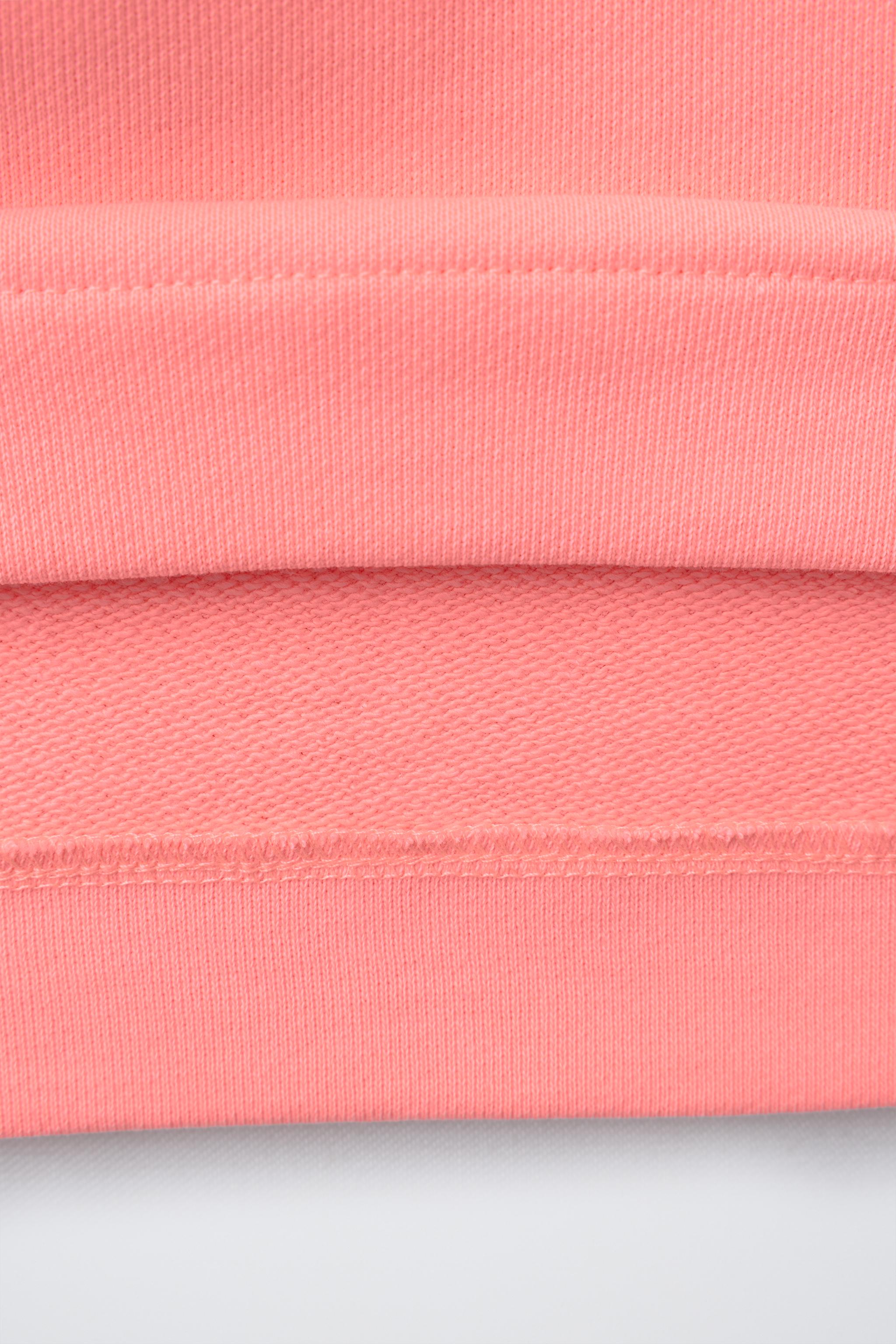 SWEATSHIRT AND RUBBERIZED FLOWER BERMUDA SET